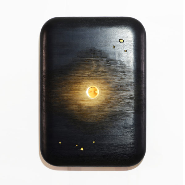 Luminous sculpture in blackened oak and gold leaf signed Hoon Moreau, artist designer of unique objects in carved wood