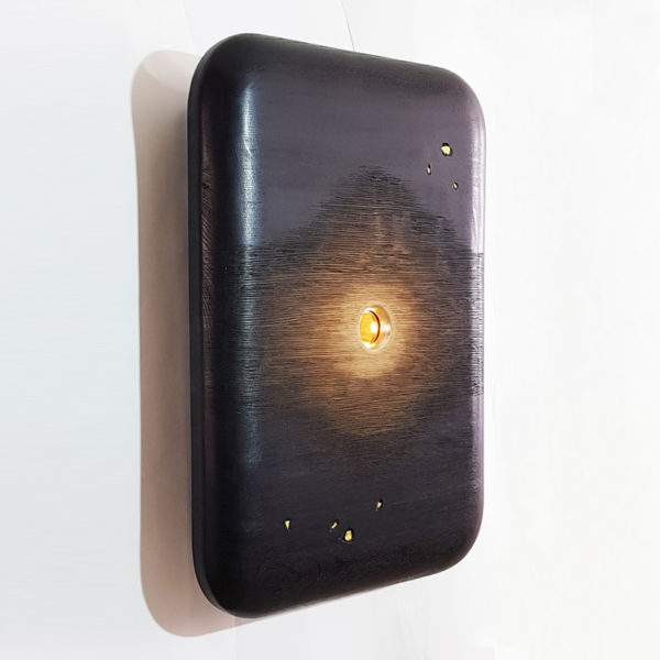 Luminous sculpture in blackened oak and gold leaf signed Hoon Moreau, artist designer of unique objects in carved wood