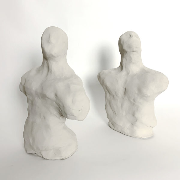 Sculptures of white clay busts signed Dainche, contemporary artist
