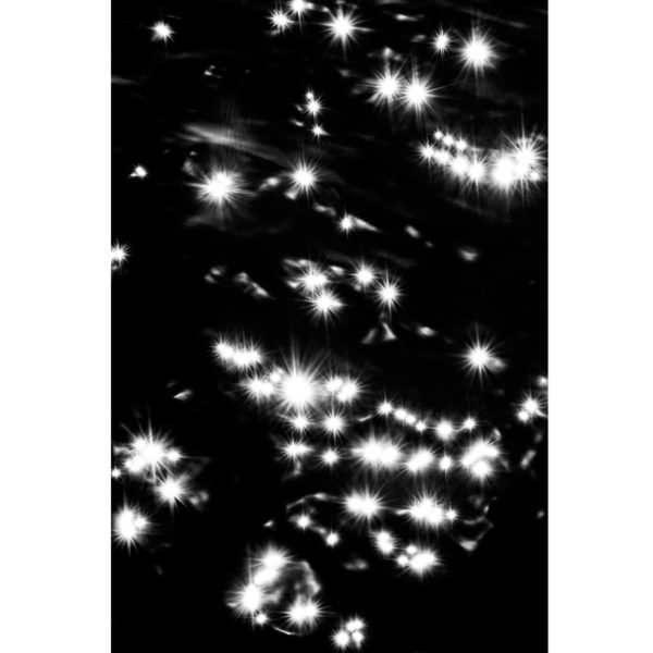 Artistic photo of reflections of light on water and constellations in black and white, by Laurent Laporte