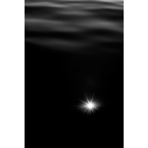 Artistic photo of reflections of light on water and constellations in black and white, by Laurent Laporte