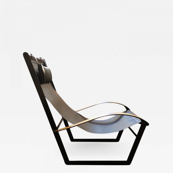 Contemporary design armchair in steel, leather and walnut signed Pierre Mounier, French designer based in Bordeaux.