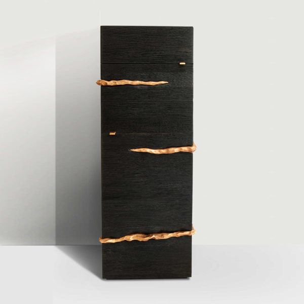 Column with drawers in solid oak stained with Indian ink and sculpted by Hoon Moreau