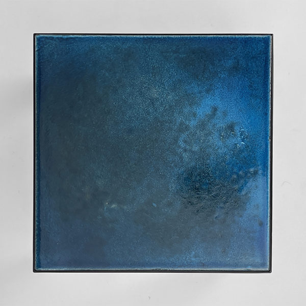 Square side table in black lacquered metal with blue top in glazed ceramic, by Gerard Simoën