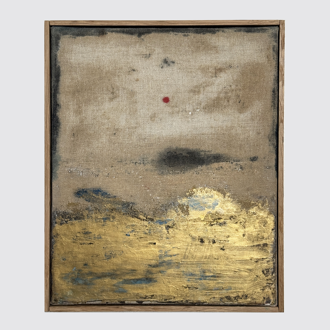 RED DOT ON GOLD HORIZON