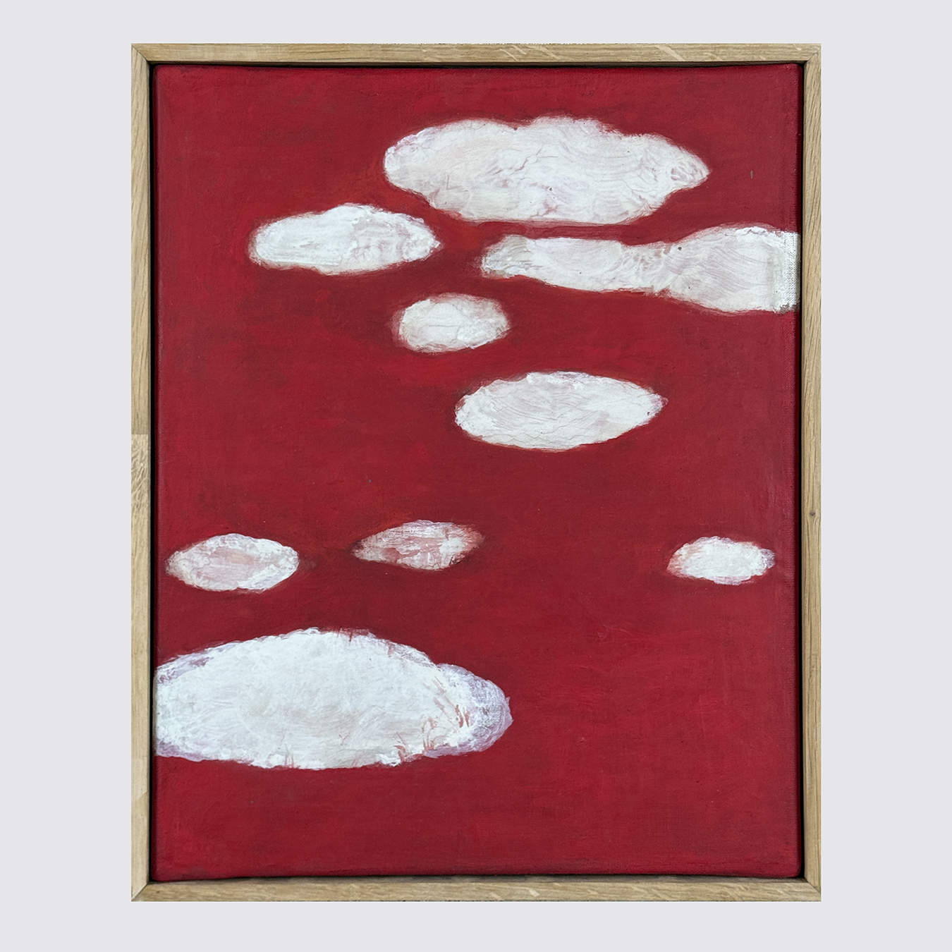 WHITE CLOUDS ON A RED BACKGROUND