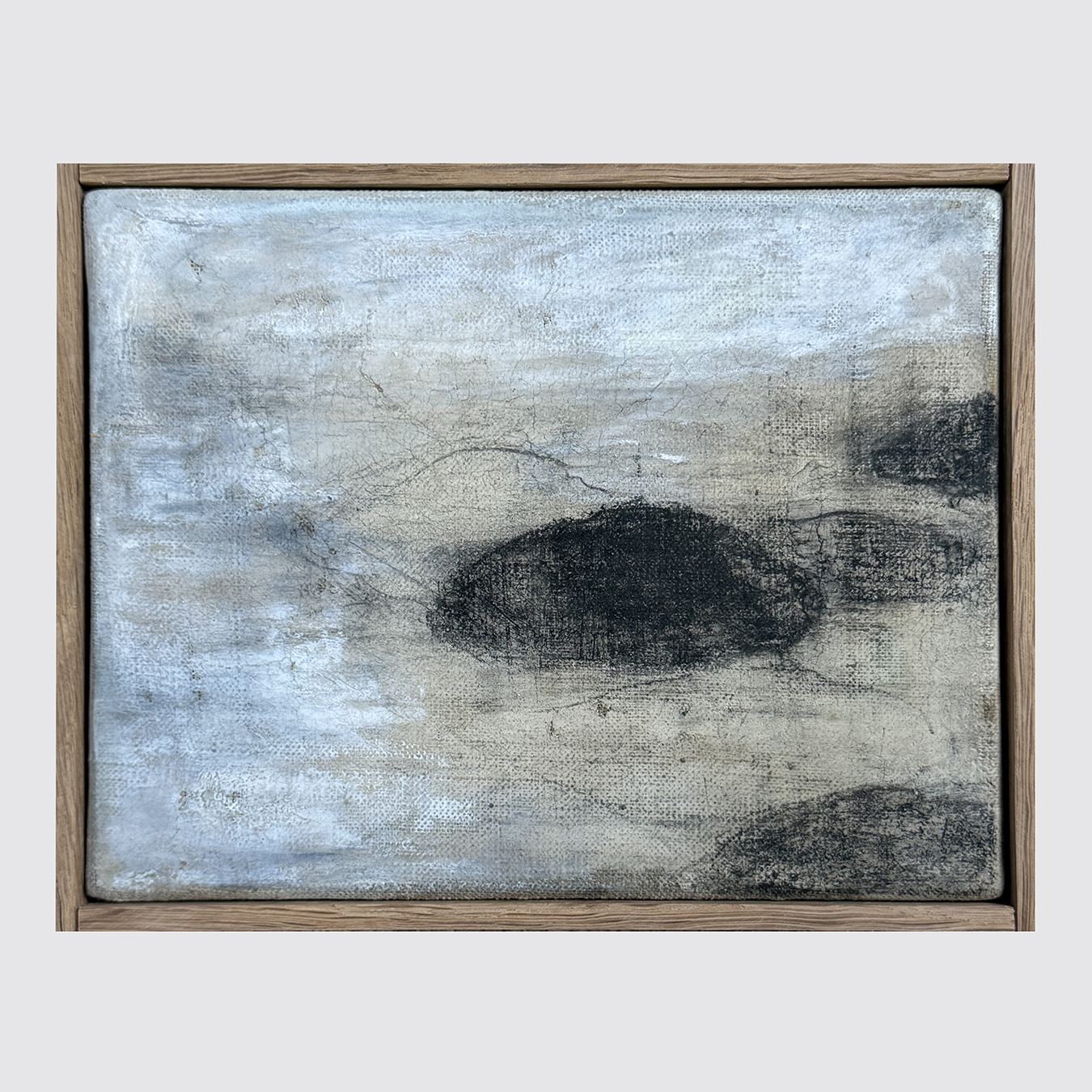 3 SMALL WHITE CLOUDS ON A GREY BACKGROUND II