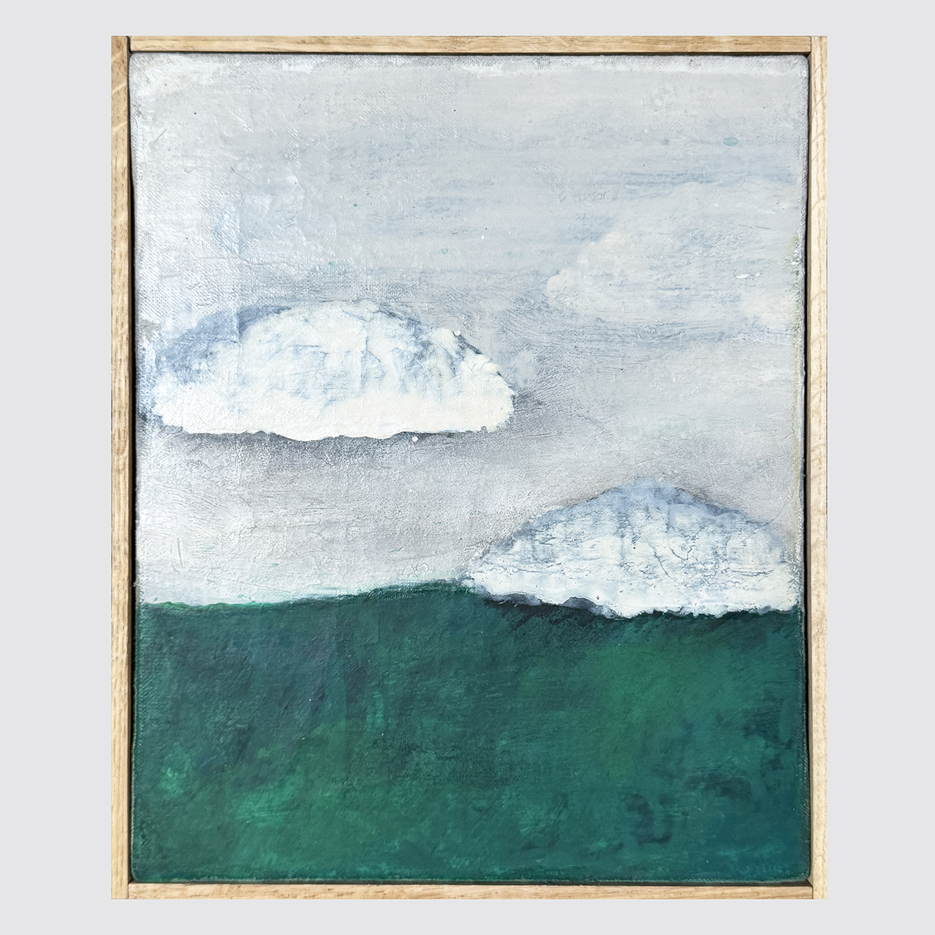 SMALL WHITE CLOUD, GREEN HORIZON
