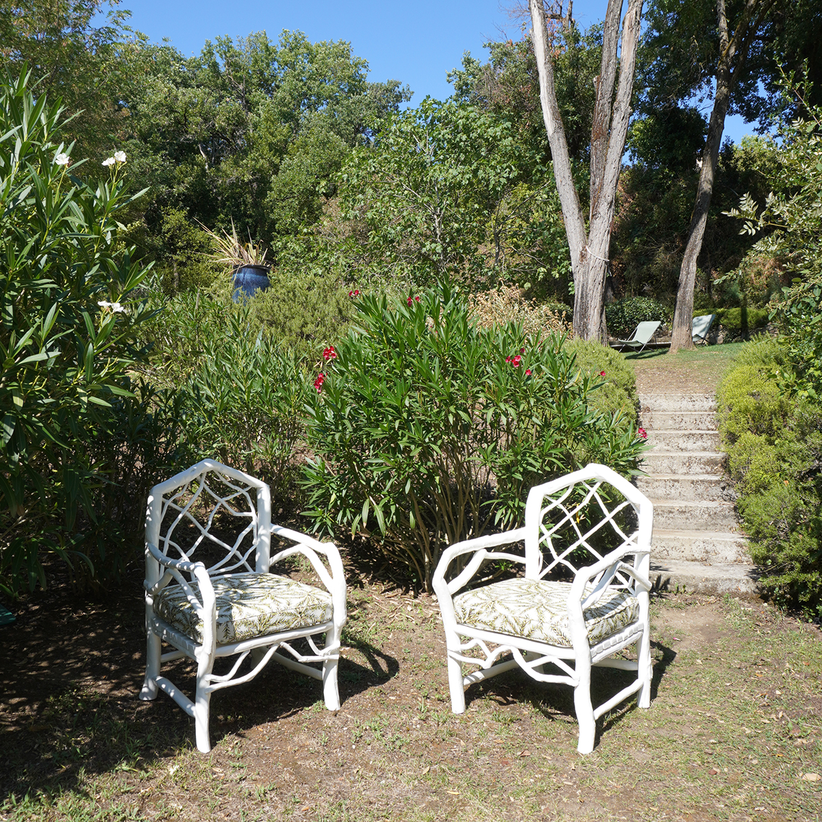 PAIR OF LOW ARMCHAIRS
