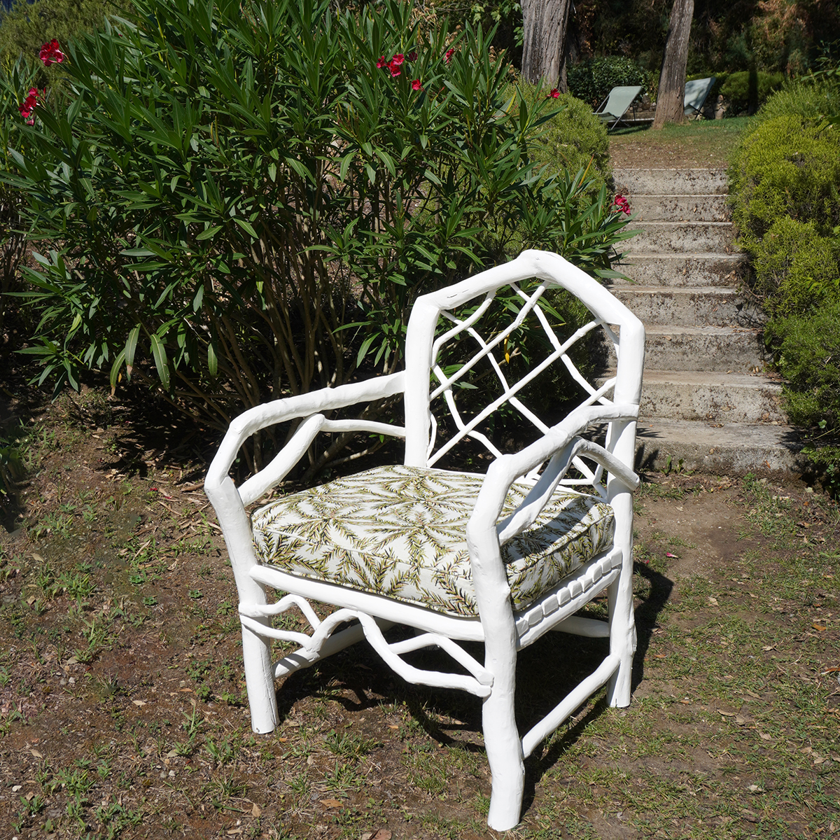 PAIR OF LOW ARMCHAIRS
