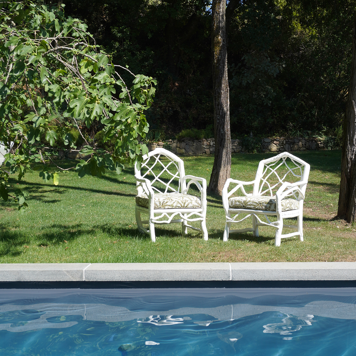 PAIR OF LOW ARMCHAIRS