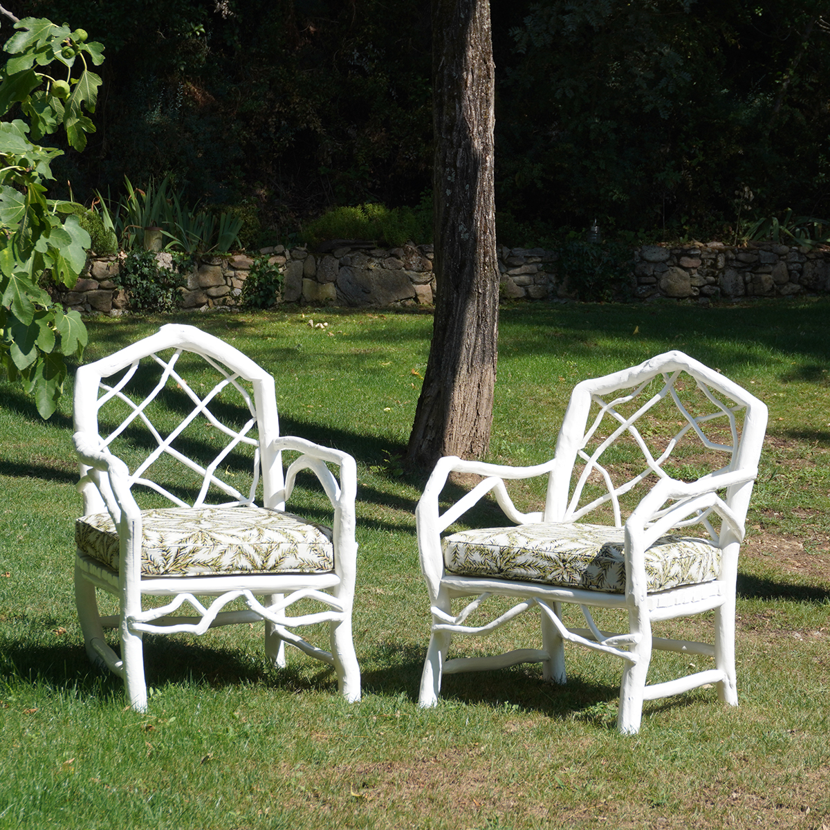 PAIR OF LOW ARMCHAIRS