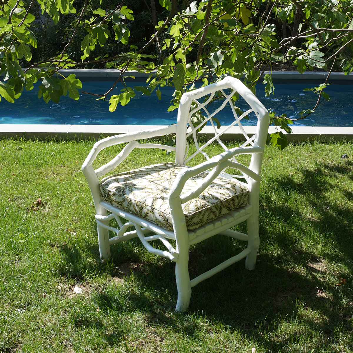 PAIR OF LOW ARMCHAIRS